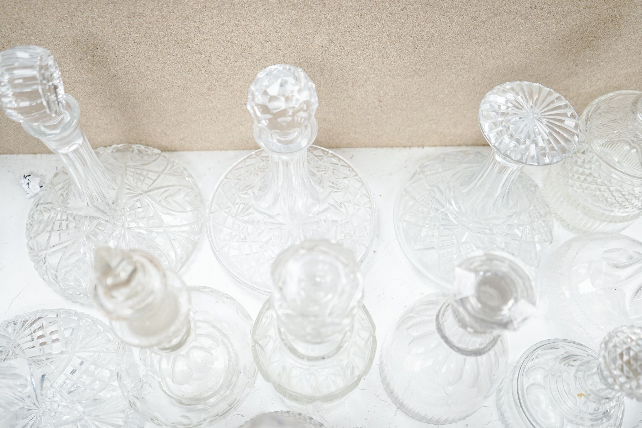 Fourteen various glass decanters 33cm